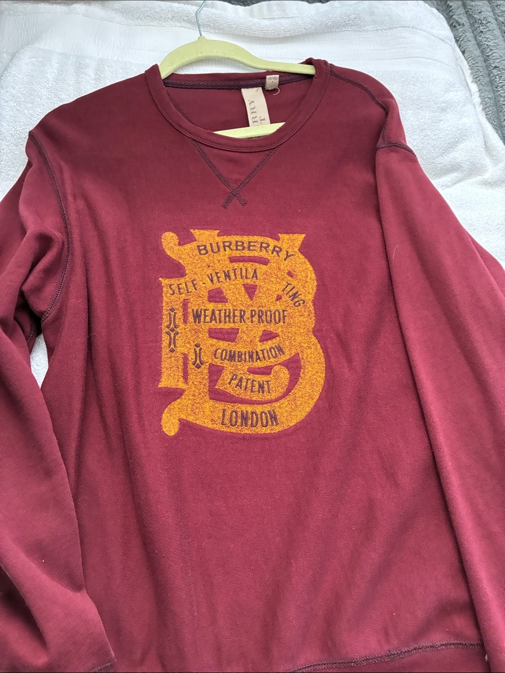 Burberry Men's Maroon Crewneck with Gold Crest Graphic